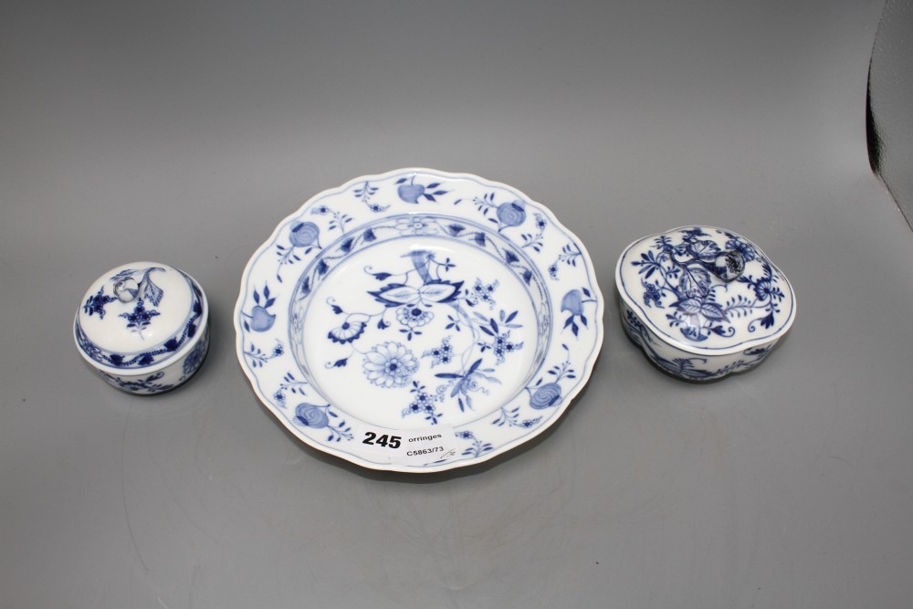 A Meissen blue and white quatrelobed bowl and cover, width 11.5cm, a circular bowl and cover, 8.5cm and a blue and white soup plate, 23